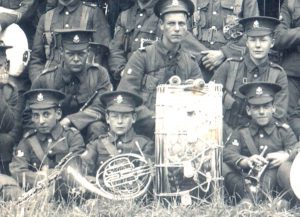 G630 close up showing (young!) bandsman with badges and drummer behind (with badge), courtesy of Michael Briggs